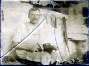 Fred working in the family workshop near Jellis / Red Row around 1900s.