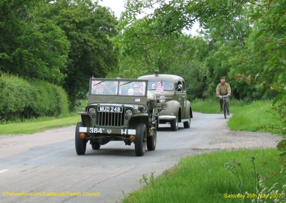 Veterans travelling by WW2 vehicles back from the airfield to the church service.