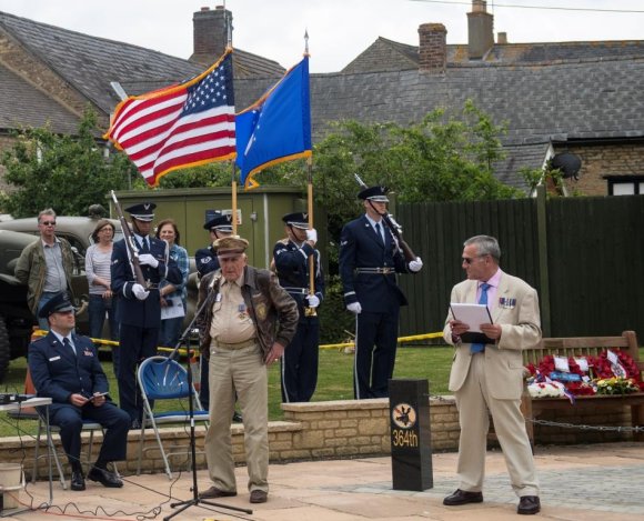 Doug Ward's speech, with the USAF Chaplain, Capt Matt Henry, seated and Cllr Glenn Harwood MBE. (Image by Joint Base McGuire-Dix-Lakehurst)